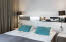 Photo by: rebeccawatsonphotography@gmail.com Bed in room Standard